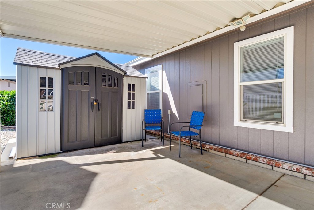 3500 Buchanan Street, Unit 230 Riverside, CA 92503 - Photo 22 of 28 Carport with shed