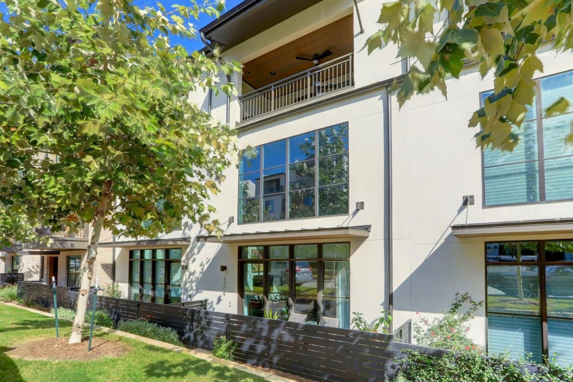 4709 Unity Circle, Unit 273 Austin, TX 78731 - Photo 2 of 14 front view of house with a yard