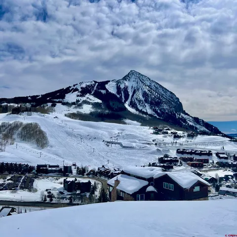 a view of a golf course with a lake