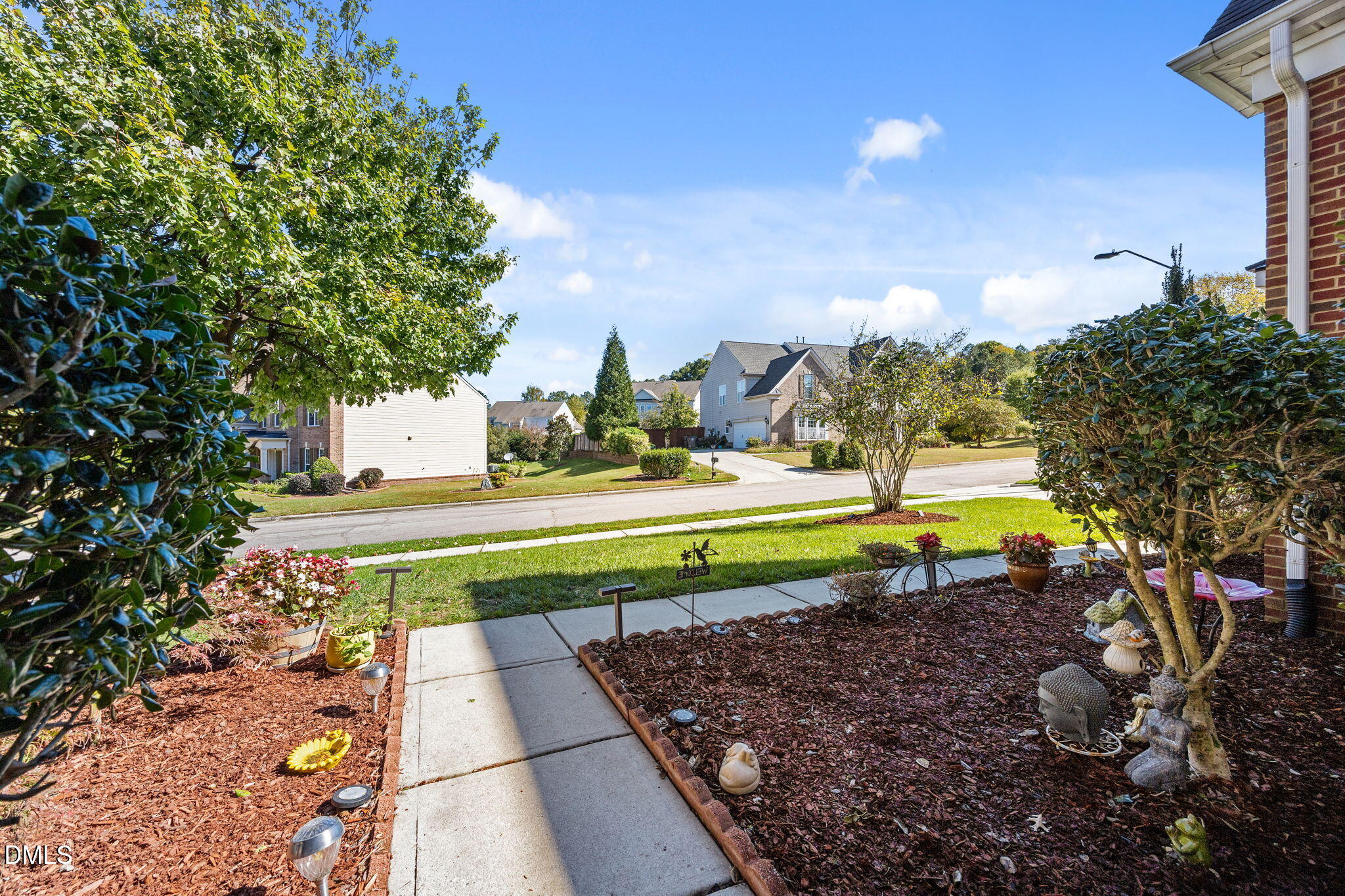 112 Rapport Drive Cary, NC 27519 - Photo 11 of 72 a view of a house with swimming pool and a yard