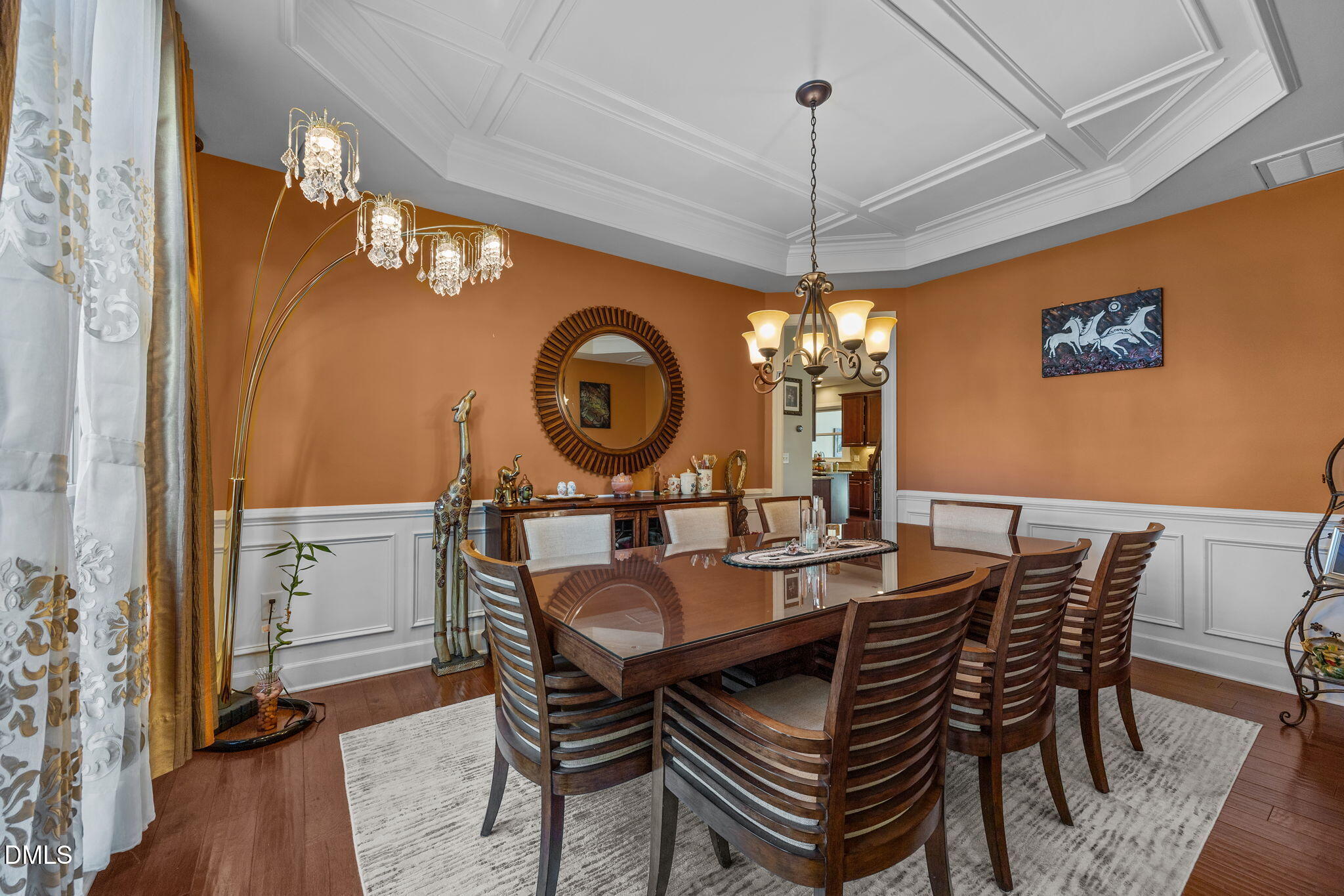 112 Rapport Drive Cary, NC 27519 - Photo 26 of 72 a dining room with a wooden table and chairs