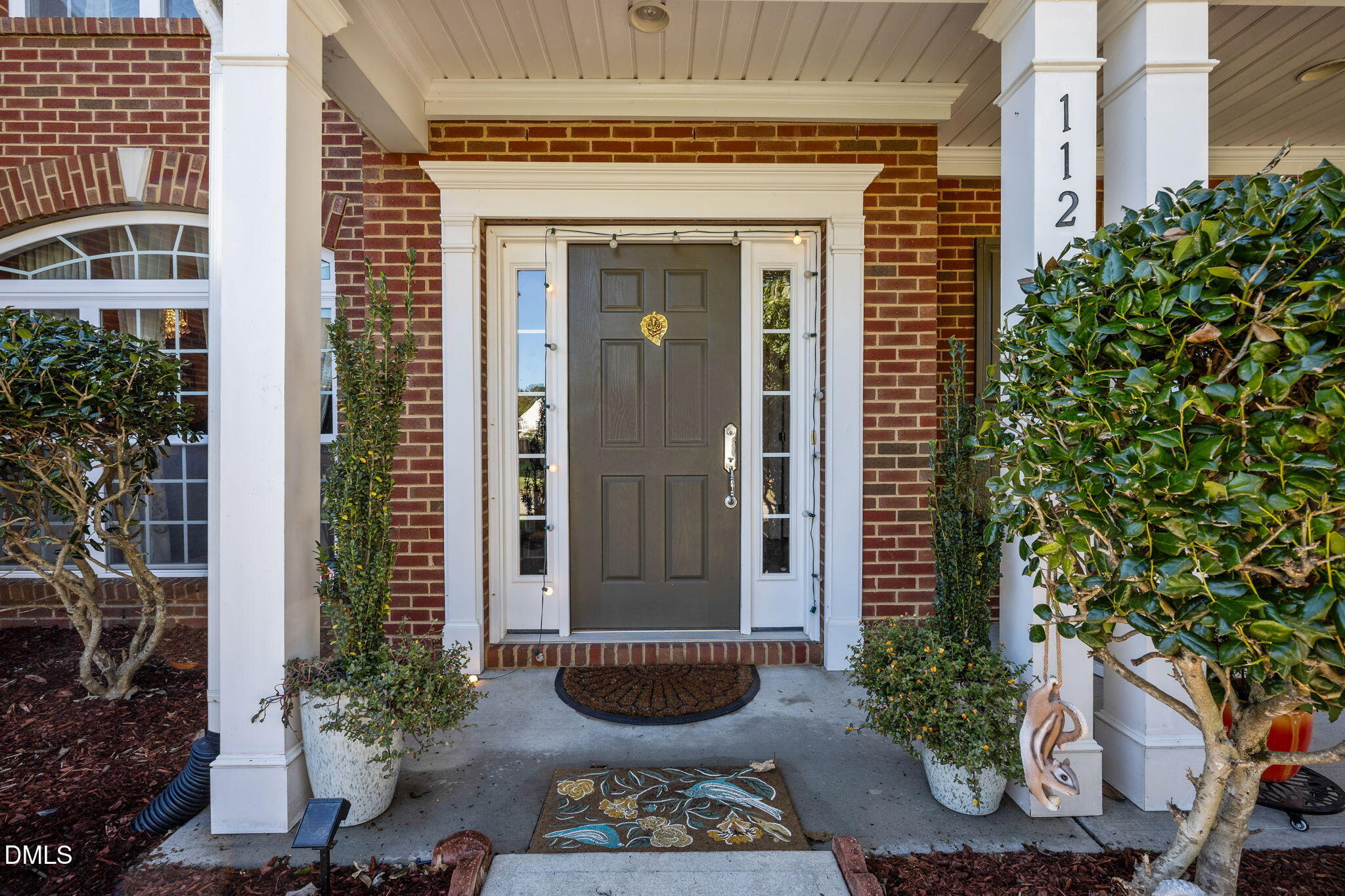 112 Rapport Drive Cary, NC 27519 - Photo 3 of 72 a front view of a house with chairs