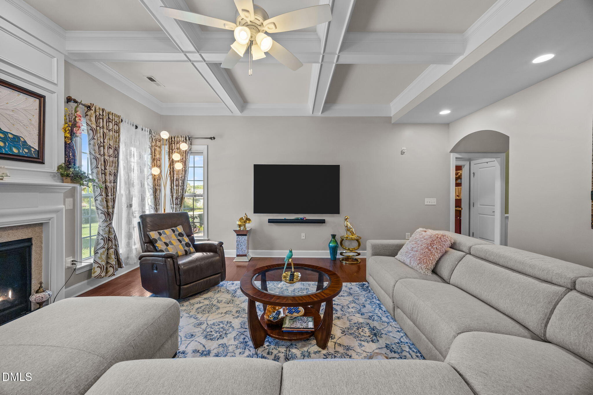 112 Rapport Drive Cary, NC 27519 - Photo 33 of 72 a living room with furniture and a flat screen tv