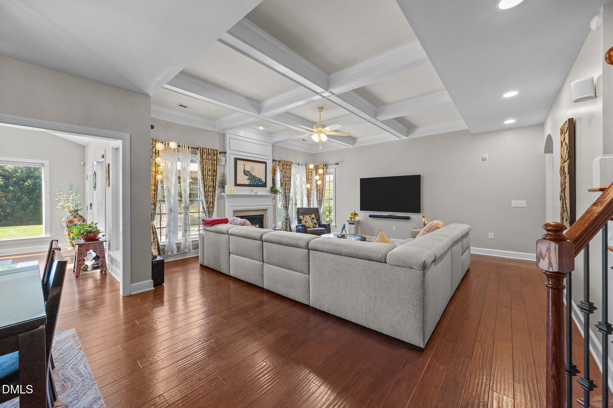 112 Rapport Drive Cary, NC 27519 - Photo 34 of 72 a living room with furniture and a flat screen tv