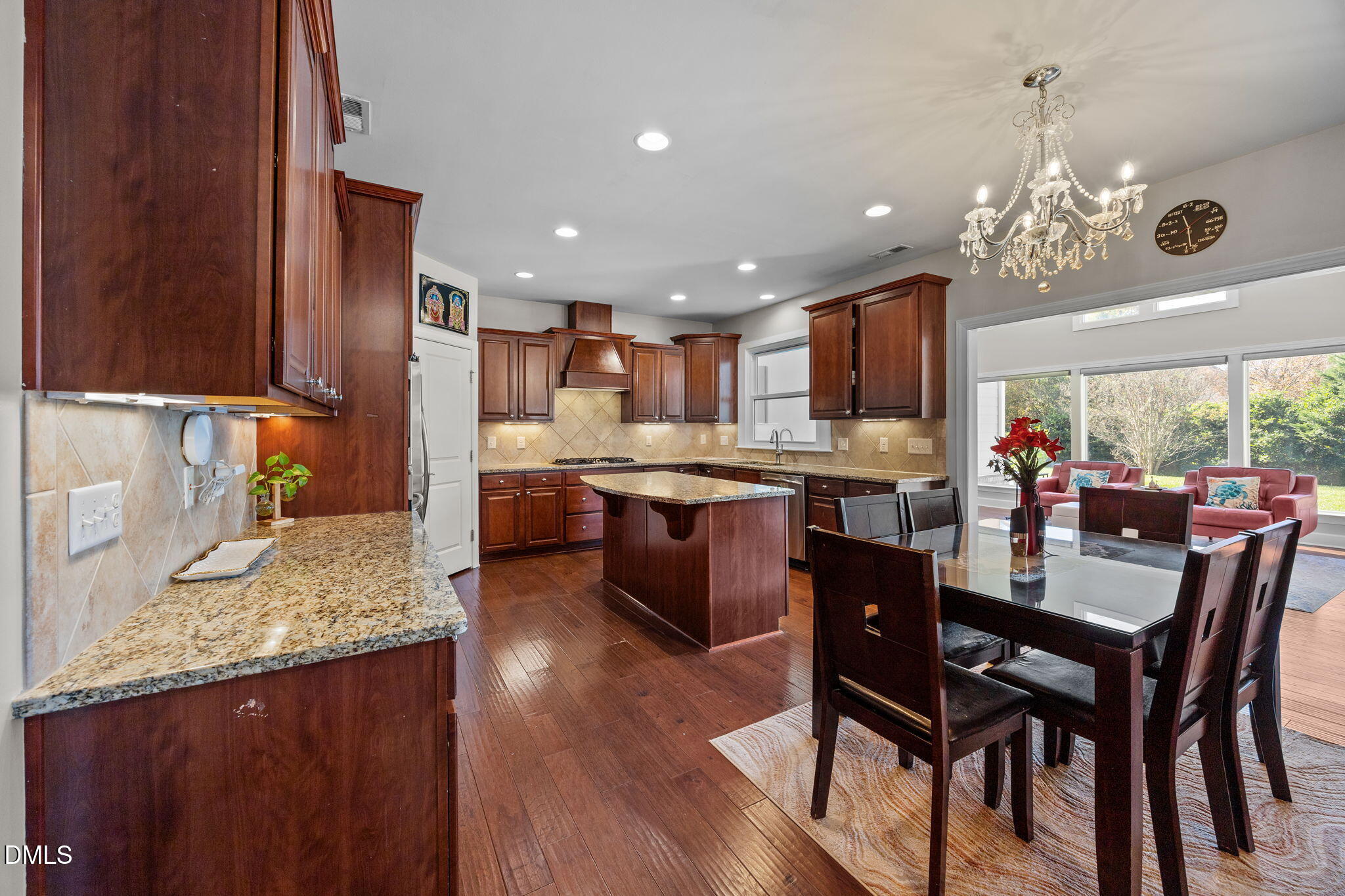 112 Rapport Drive Cary, NC 27519 - Photo 36 of 72 a large kitchen with a table and chairs