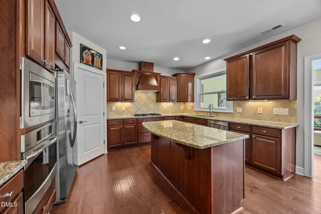 a bathroom with a tub and a shower