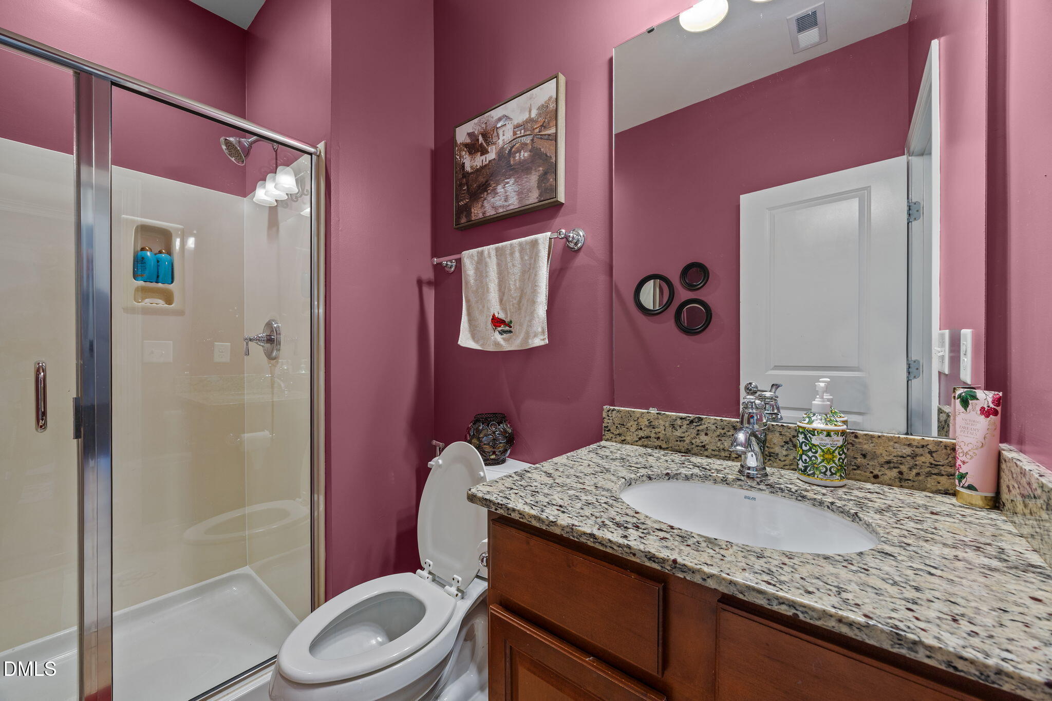 112 Rapport Drive Cary, NC 27519 - Photo 44 of 72 a bathroom with a granite countertop toilet sink and shower
