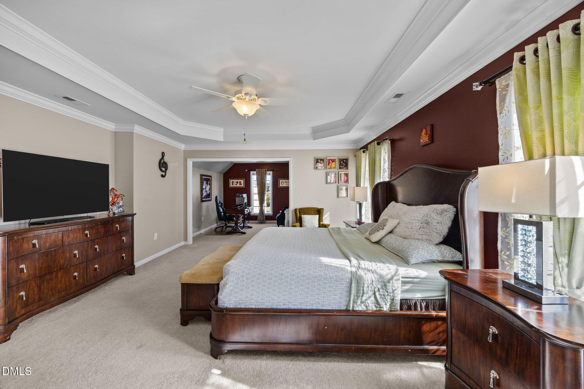 112 Rapport Drive Cary, NC 27519 - Photo 48 of 72 a bedroom with a bed and a flat screen tv