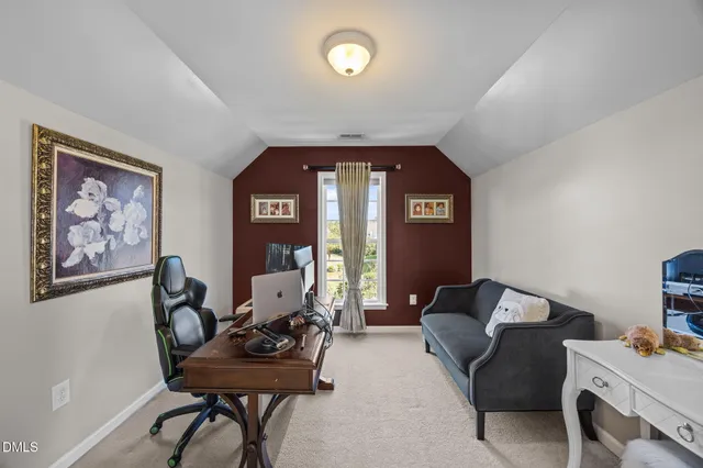 a front view of a house with a yard outdoor seating and barbeque oven