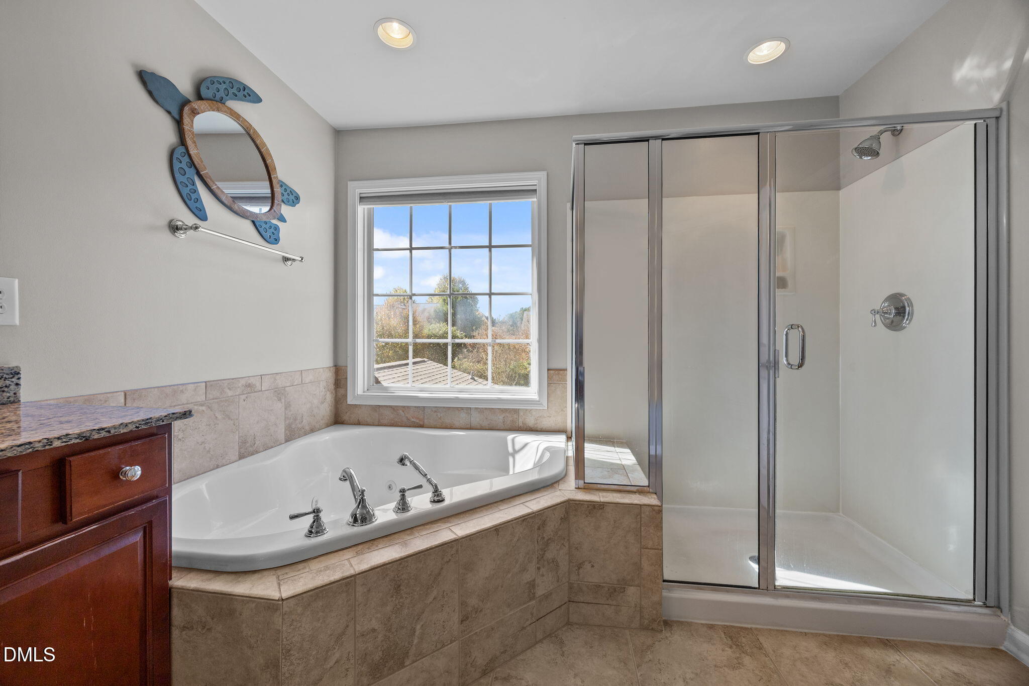 112 Rapport Drive Cary, NC 27519 - Photo 54 of 72 a bathroom with a tub and a shower