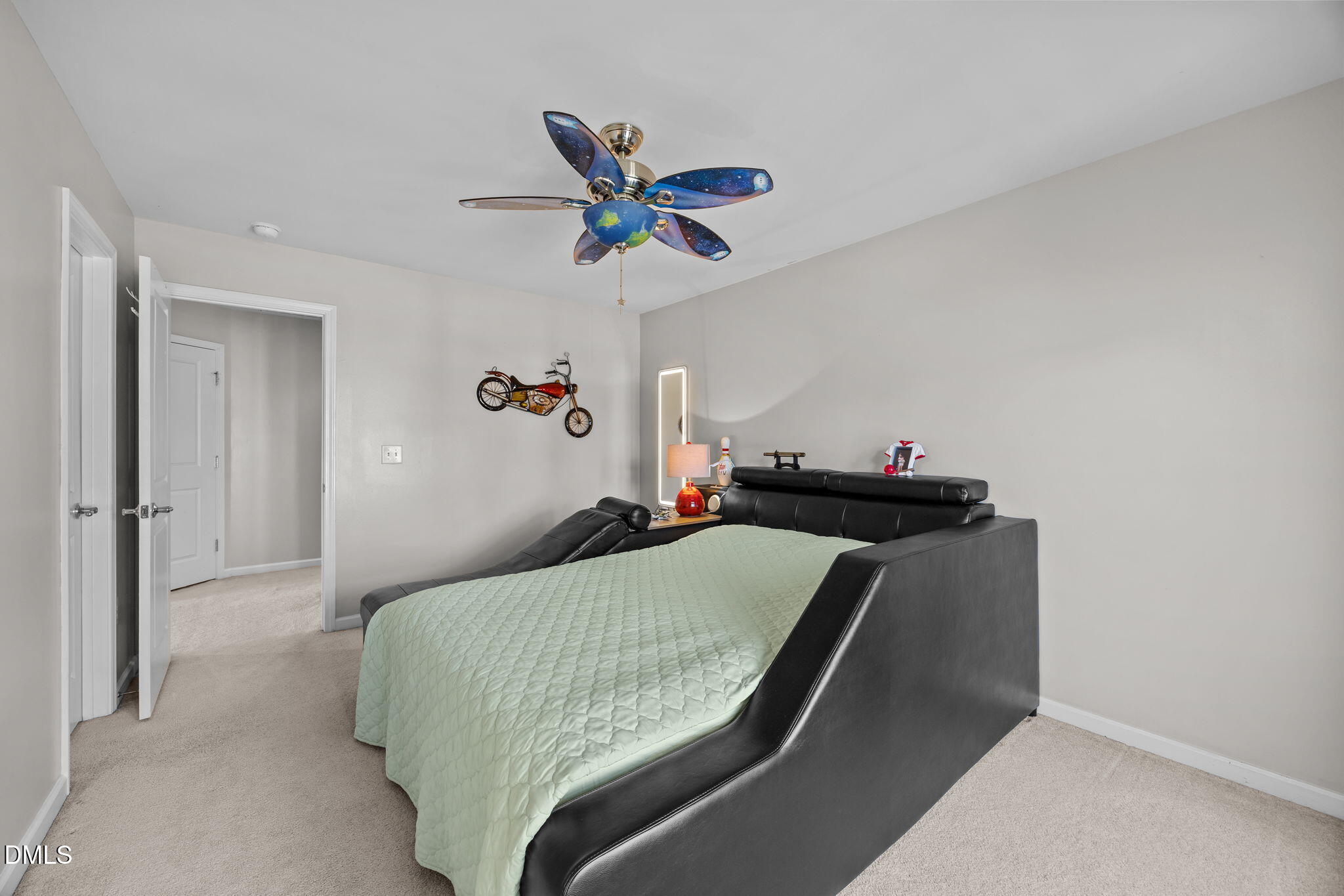 112 Rapport Drive Cary, NC 27519 - Photo 56 of 72 a bedroom with a bed and a ceiling fan