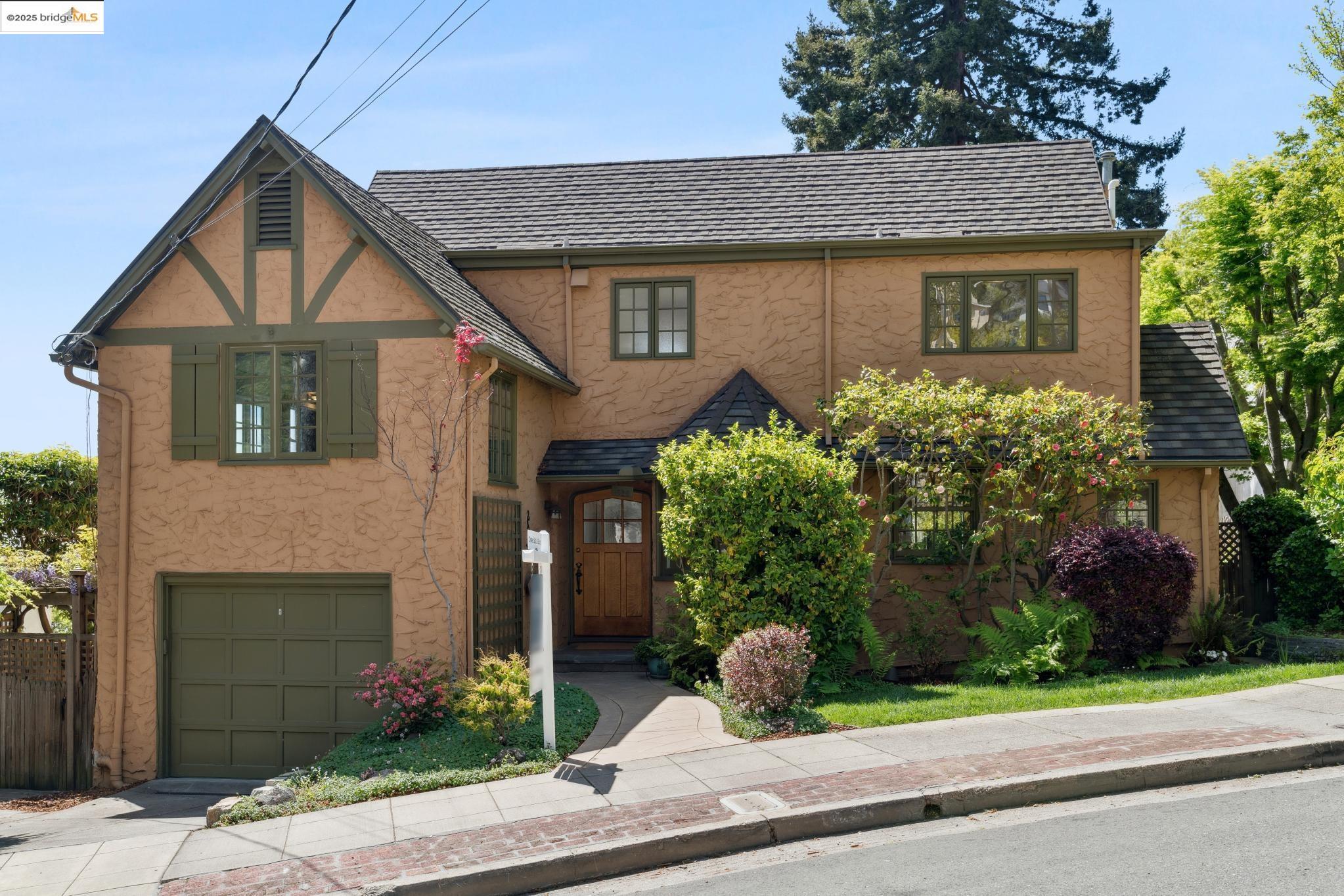 1626 Le Roy Avenue Berkeley, CA 94709 - Photo 1 of 1 a view of a house with a yard and potted plants