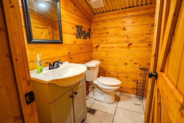 2167 Powdermill Hill Road Lawrenceburg, TN 38464 - Photo 16 of 33 a bathroom with a sink and toilet