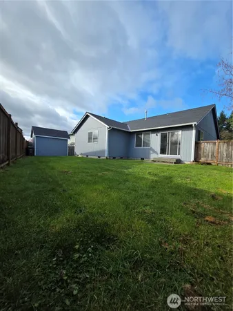 a house view with a garden space