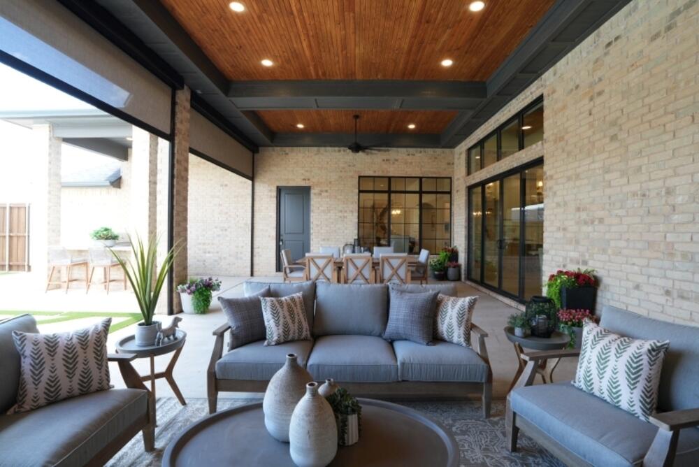 4101 149th Street Lubbock, TX 79423 - Photo 47 of 53 a outdoor living space with furniture and a large window