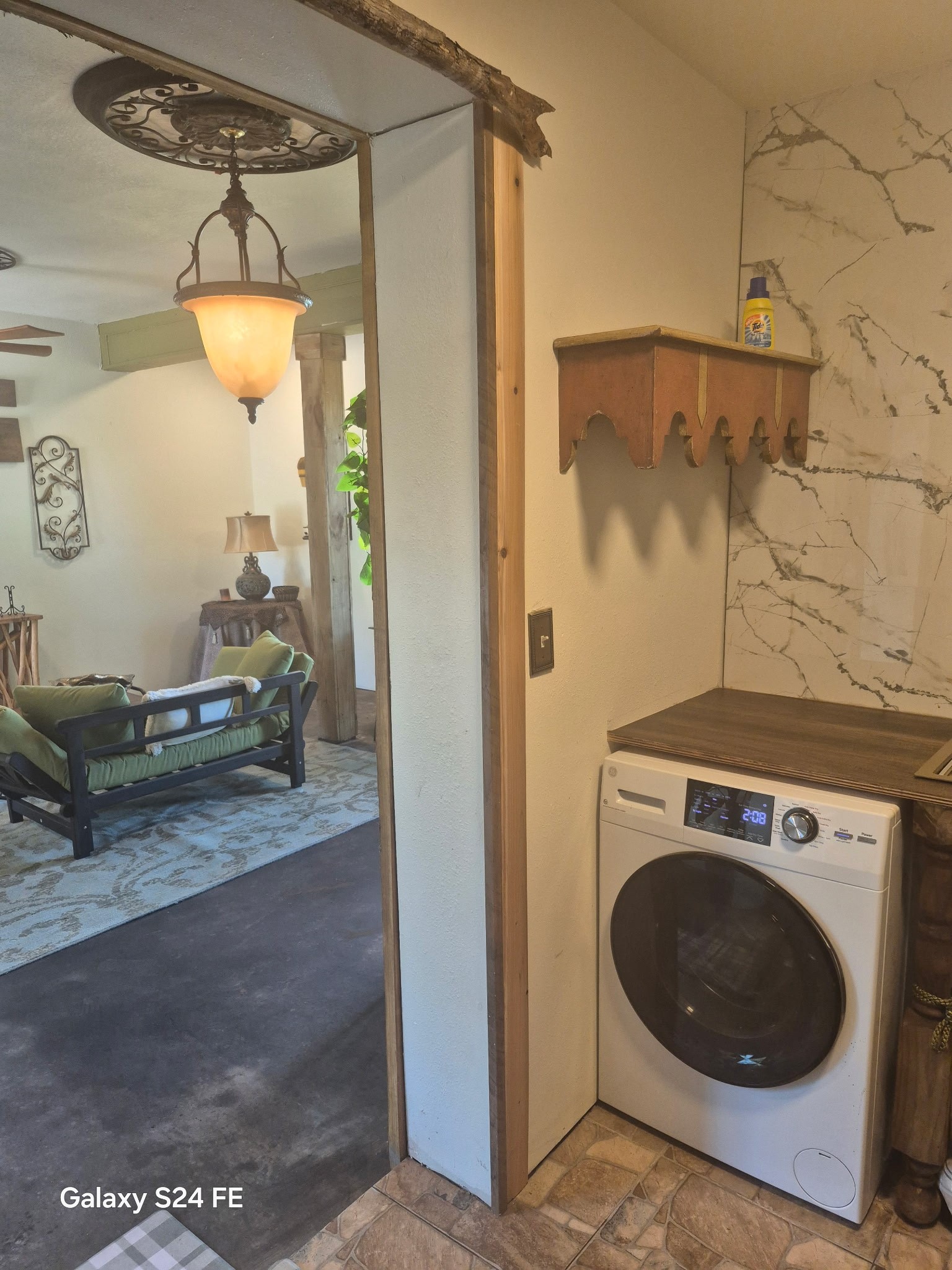 2503 River Crest, Unit 1 Houston, TX 77338 - Photo 18 of 23 a view of a storage & utility room with a washer dryer