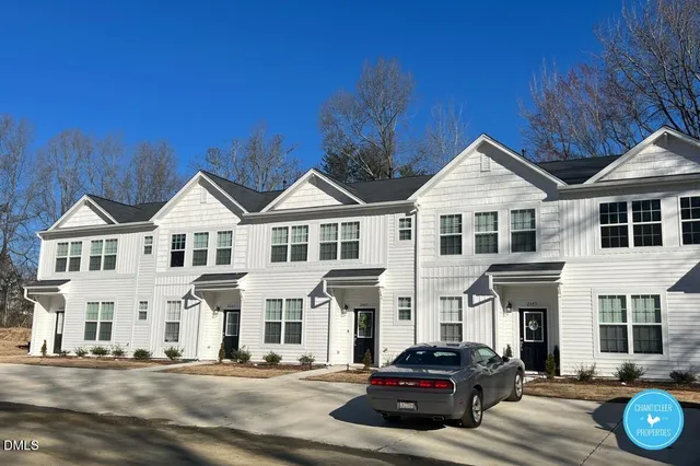 a front view of a house with yard