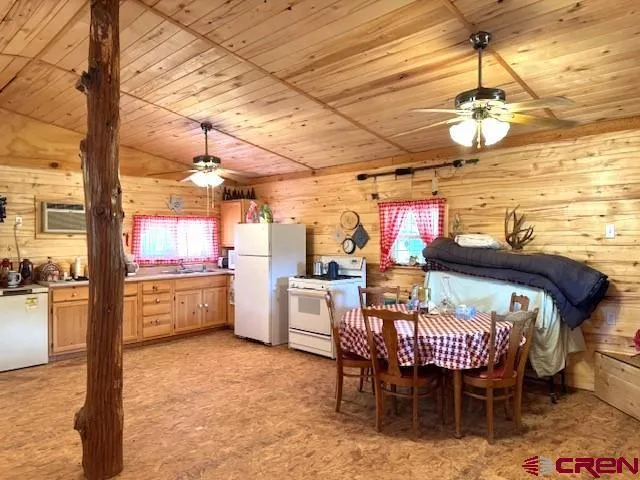 a view of a chairs and table in the patio
