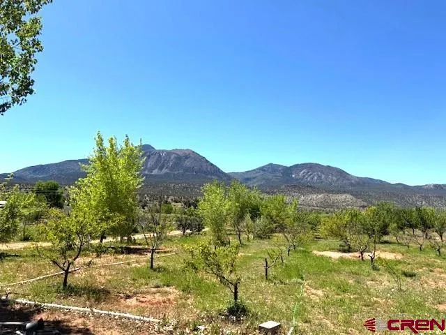 a view of a lake from a balcony