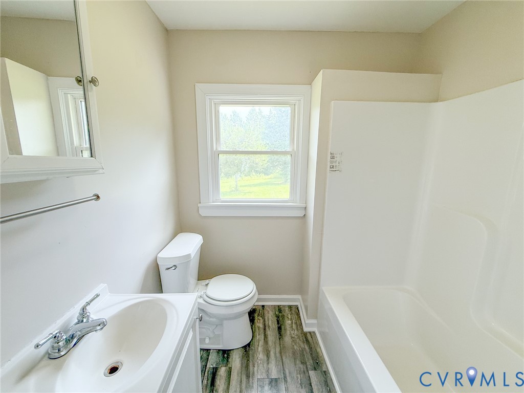 7798 West Courthouse Road Burkeville, VA 23922 - Photo 9 of 23 Bathroom featuring a white vanity with integrated