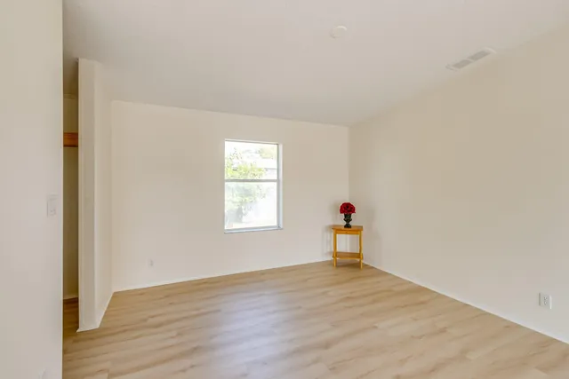 a kitchen with stainless steel appliances granite countertop a stove and a refrigerator