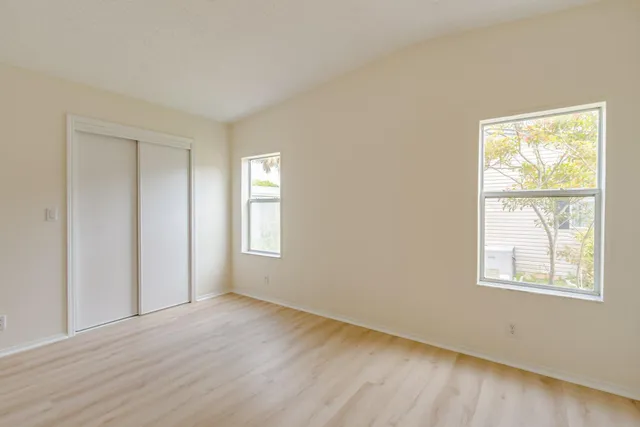 a bathroom with a shower and a sink