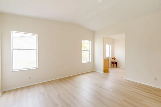 a view of a lake with a city