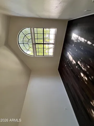 a view of a hallway with washer and dryer