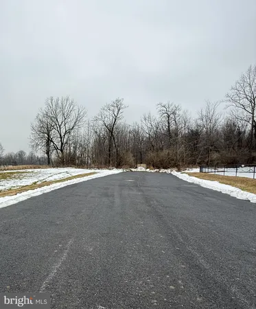 a picture of a glass door with white and white walls