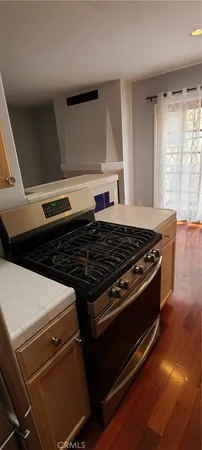 a close up of a stove top oven sitting inside of a kitchen