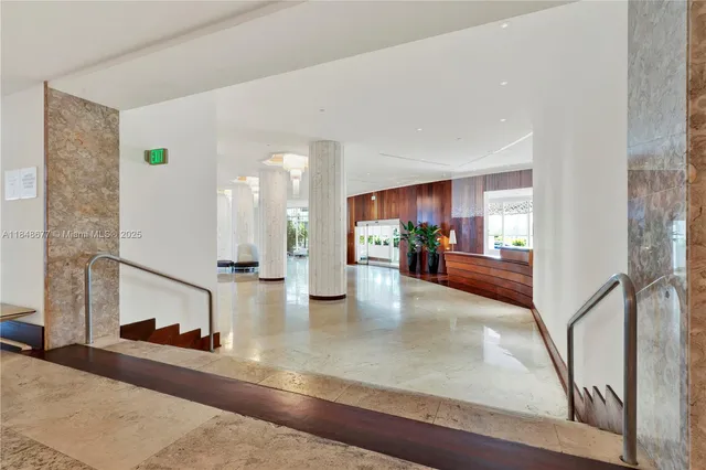 a view of a living room and kitchen view