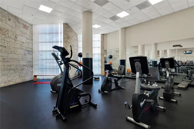 a view of a room with gym equipment