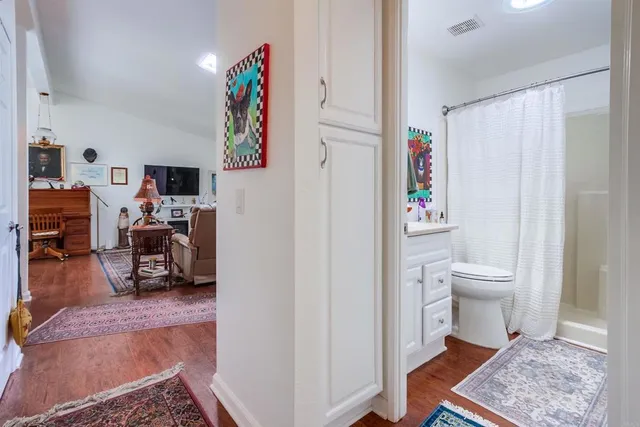a living room with furniture and a rug