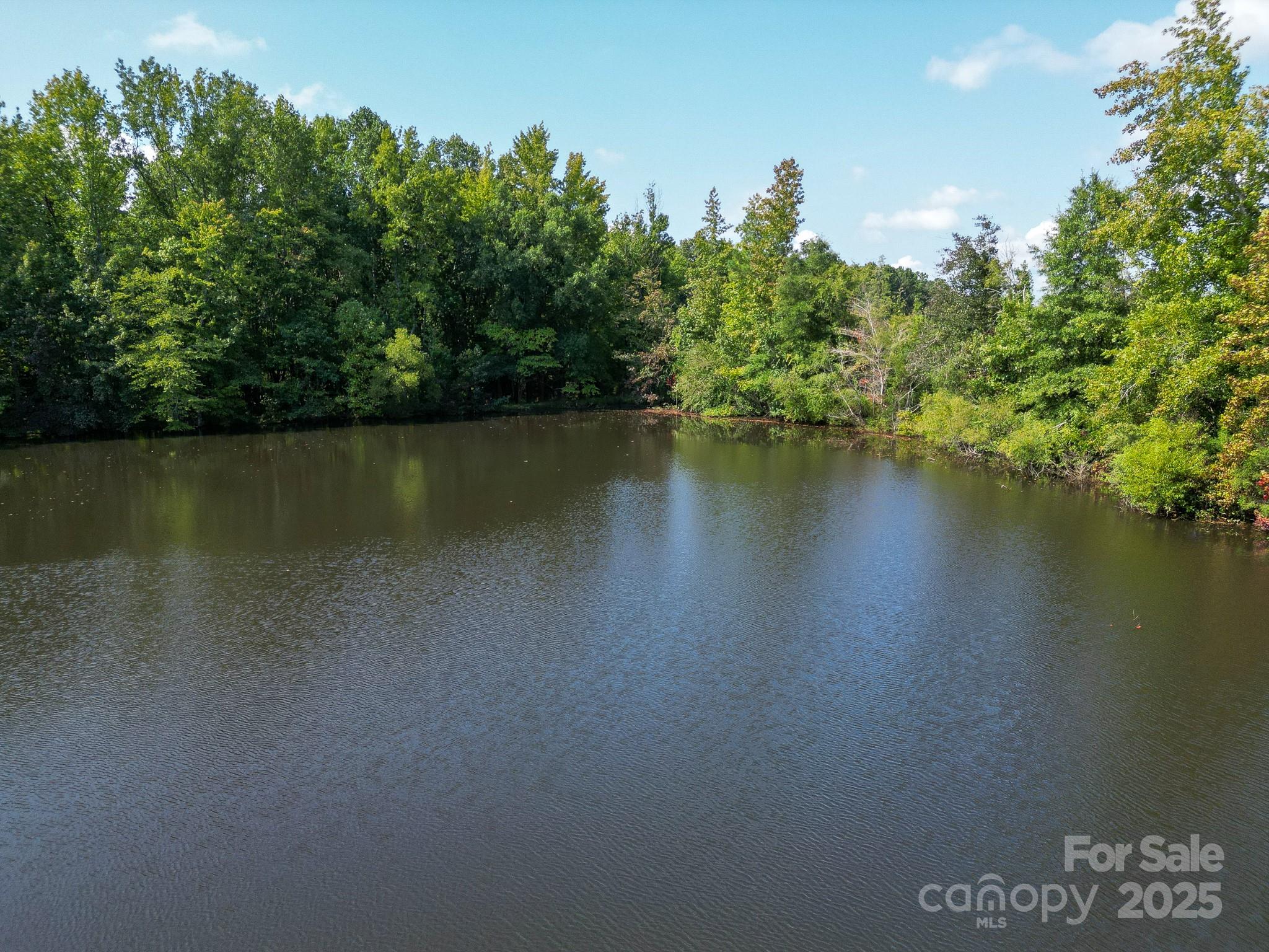 0 South Providence Road South, Unit 2 Waxhaw, NC 28173 - Photo 15 of 33 a view of a lake with houses