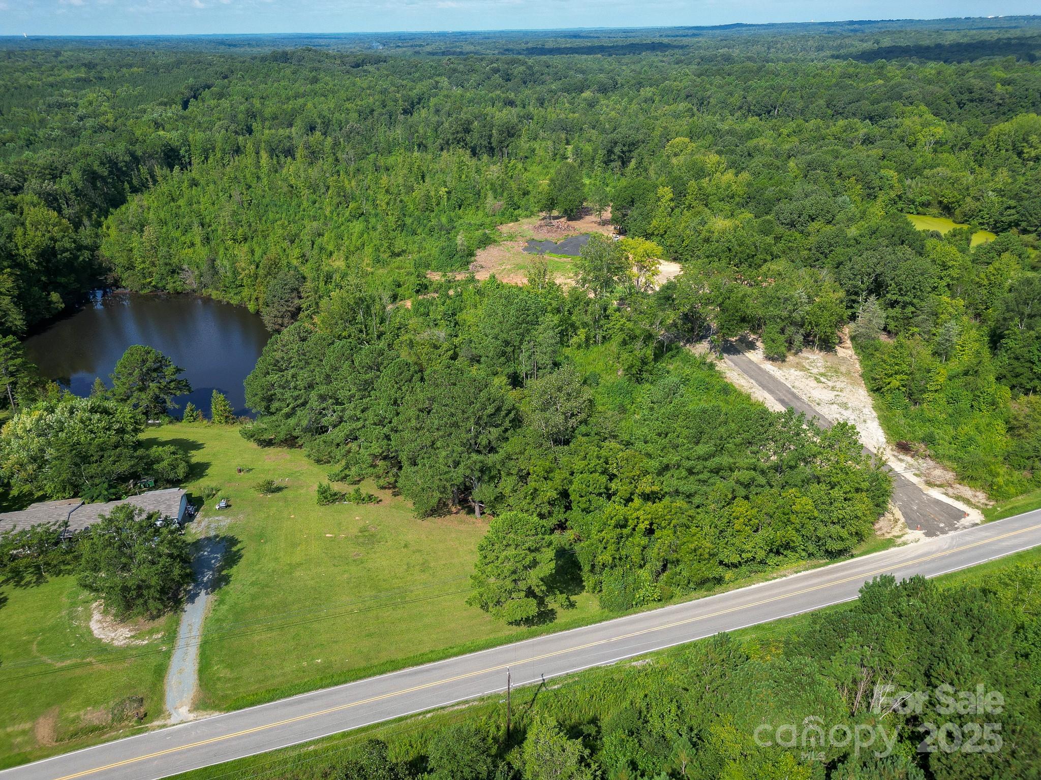 0 South Providence Road South, Unit 2 Waxhaw, NC 28173 - Photo 20 of 33 a view of a garden from a balcony