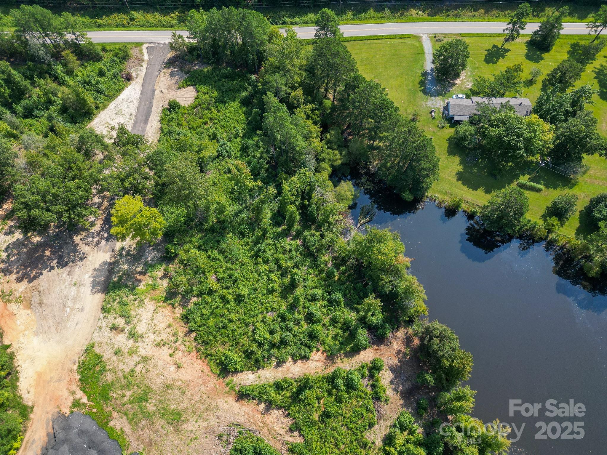 0 South Providence Road South, Unit 2 Waxhaw, NC 28173 - Photo 2 of 33 a view of a garden with a building