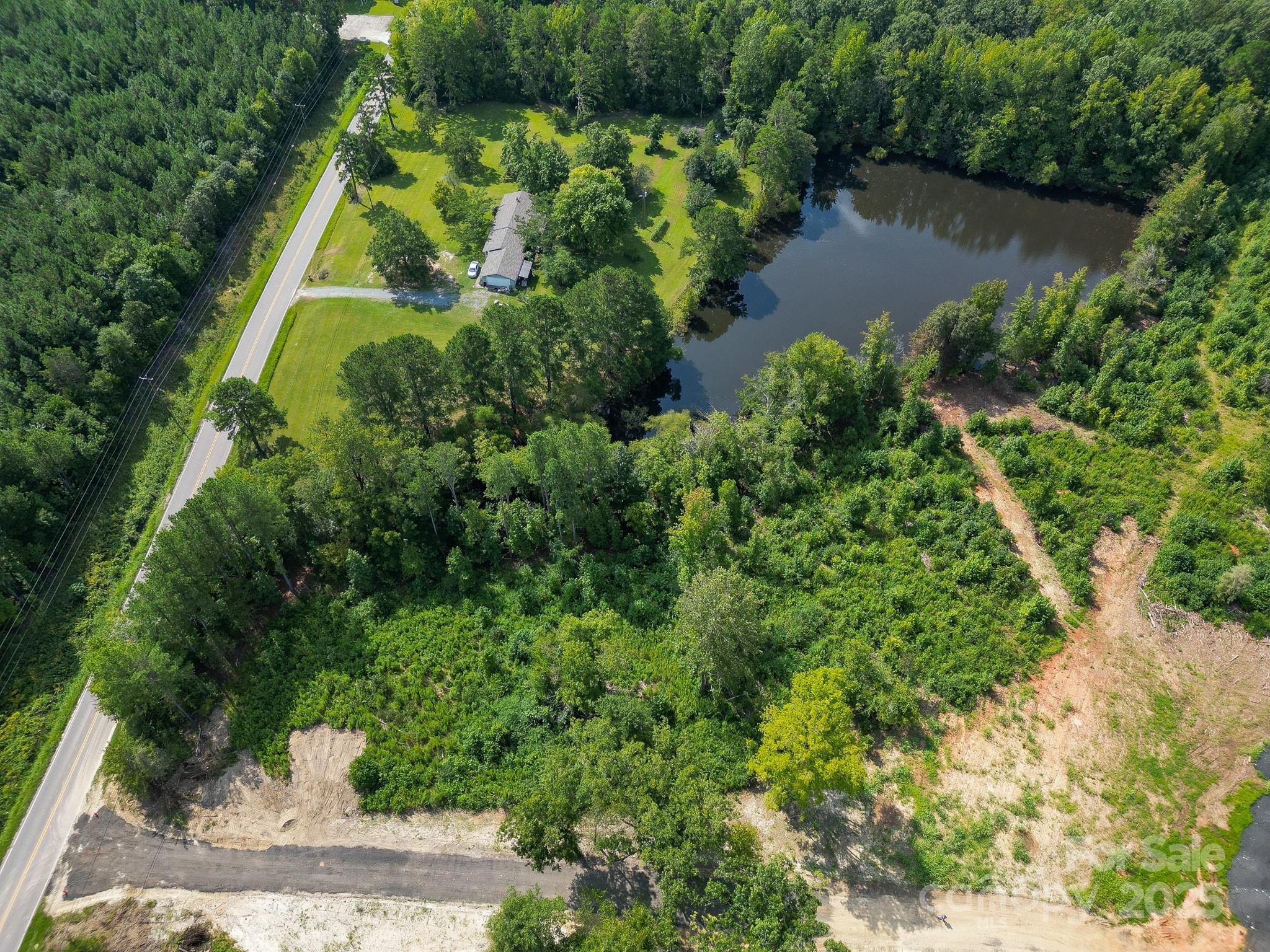 0 South Providence Road South, Unit 2 Waxhaw, NC 28173 - Photo 21 of 33 an aerial view of a house with a yard