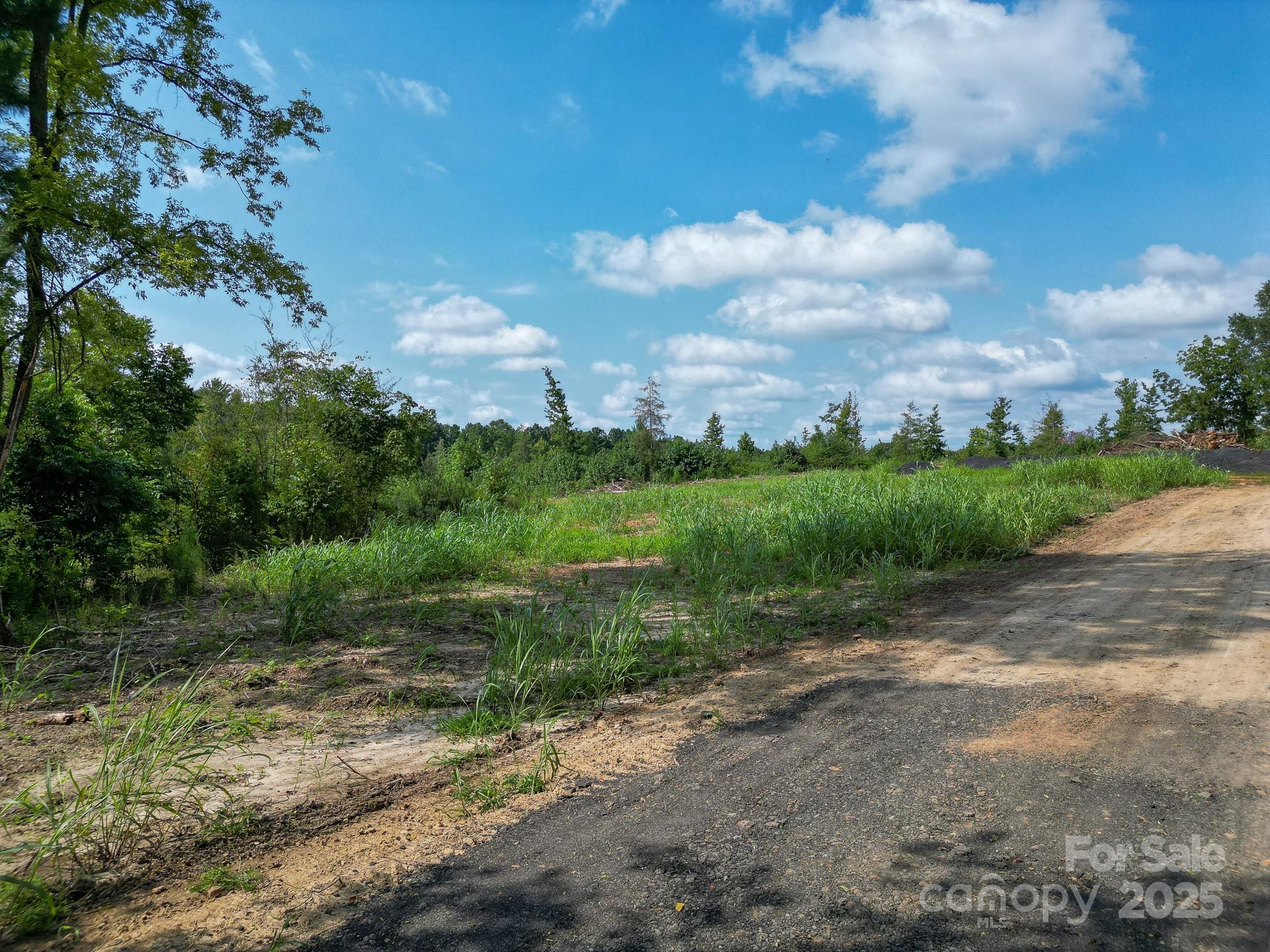 0 South Providence Road South, Unit 2 Waxhaw, NC 28173 - Photo 24 of 33 a view of a road with a yard