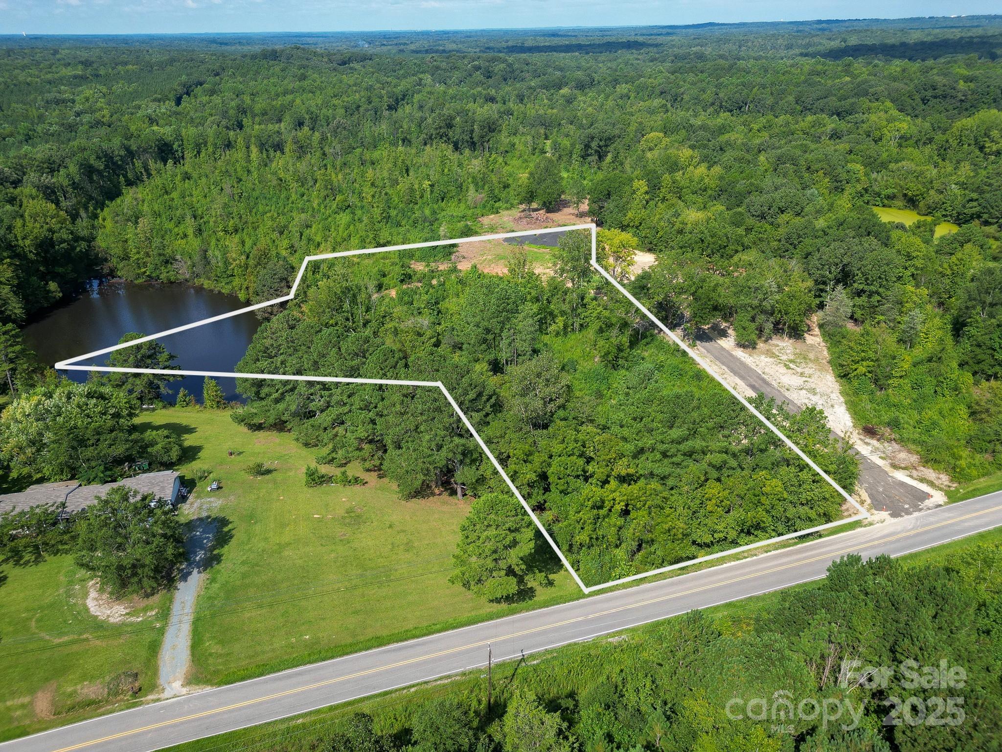 0 South Providence Road South, Unit 2 Waxhaw, NC 28173 - Photo 30 of 33 a view of a yard