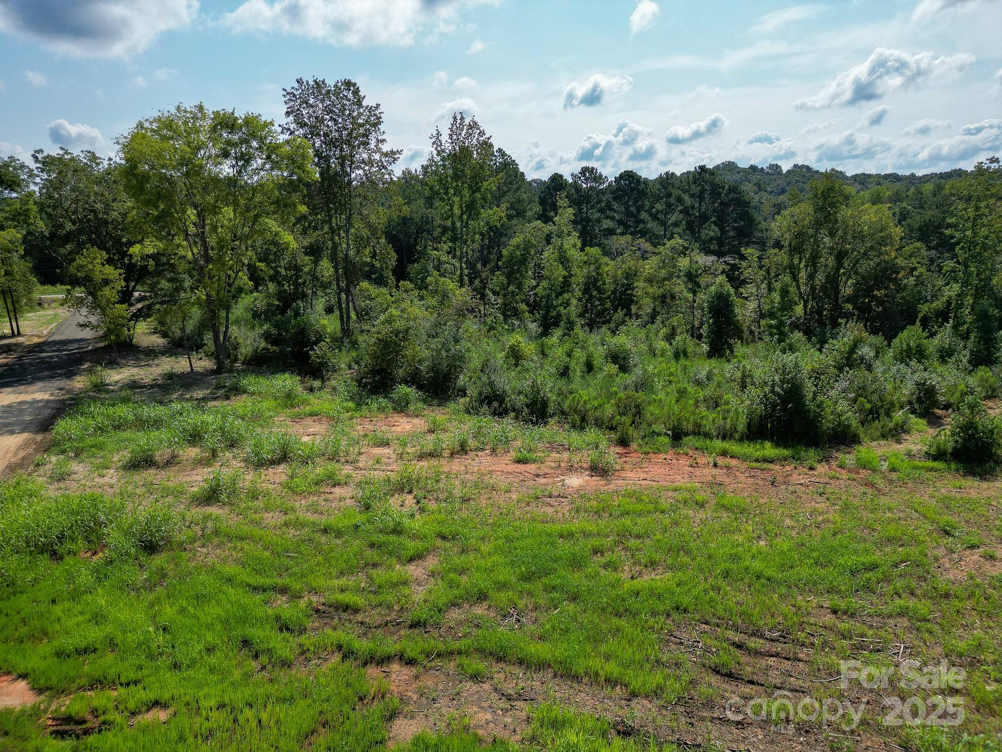 0 South Providence Road South, Unit 2 Waxhaw, NC 28173 - Photo 8 of 33 a view of outdoor space with trees all around
