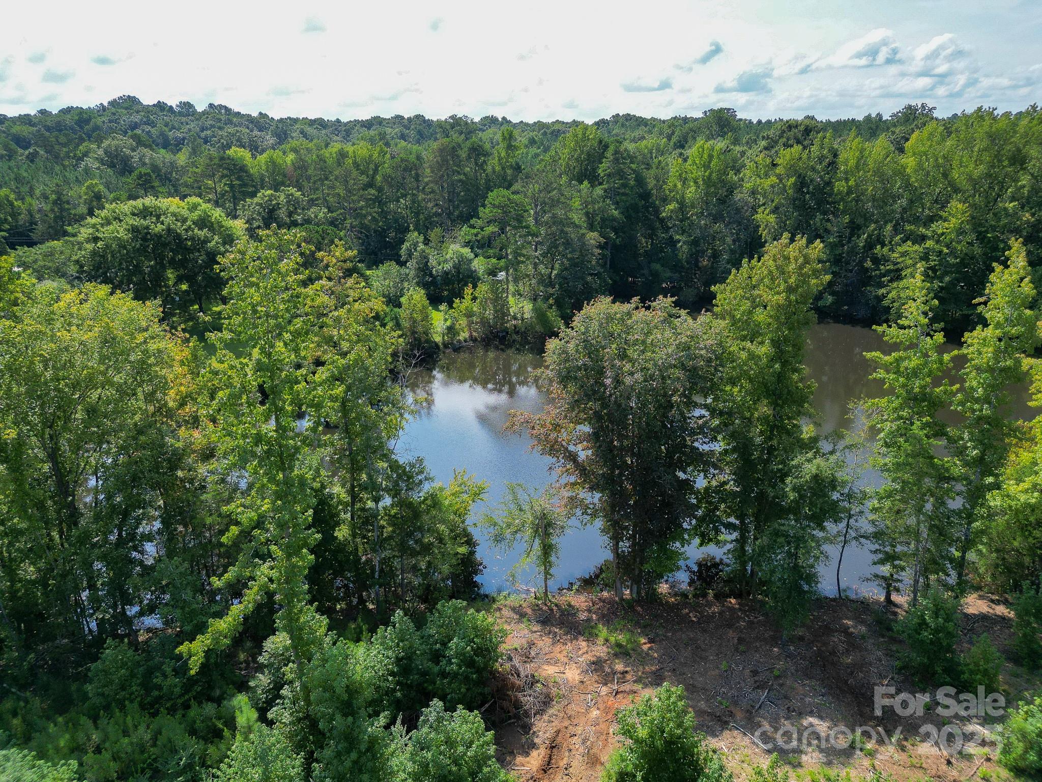 0 South Providence Road South, Unit 2 Waxhaw, NC 28173 - Photo 10 of 33 an aerial view of residential house with outdoor space and trees all around