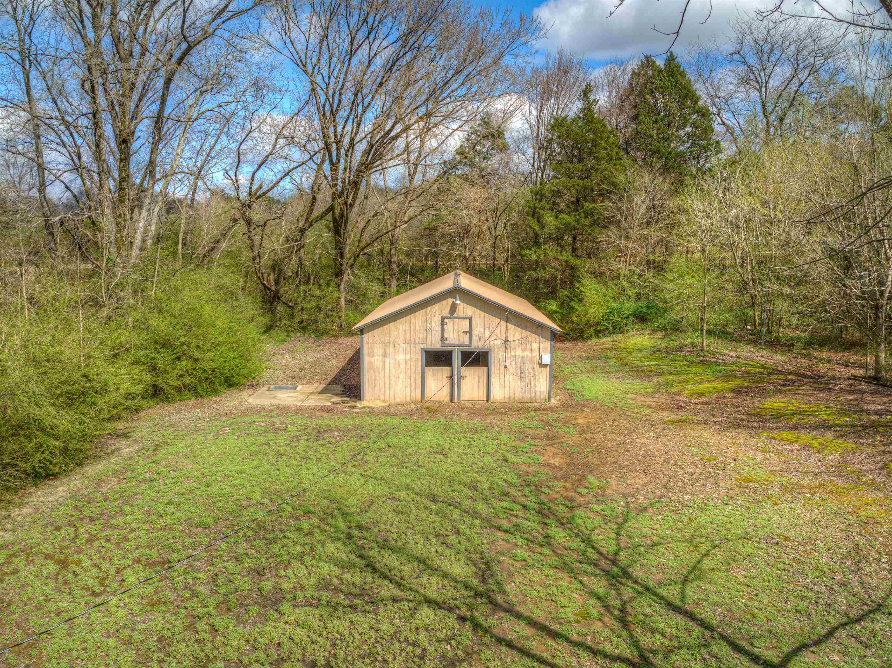 1138 North Collierville Arlington Road Collierville, TN 38017 - Photo 24 of 25 Tons of space and storage in this powered barn. Perfect for the small time, amateur, or wannabe farmer! Area in the back would make a great workshop as well.