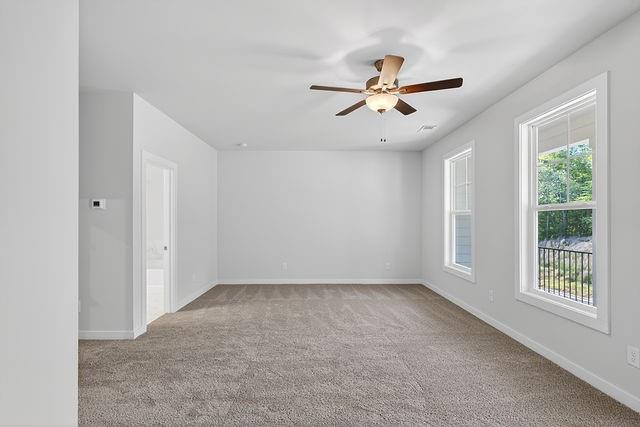 2562 Harbor Ridge Pass Gainesville, GA 30507 - Photo 23 of 27 a view of room with window and ceiling fan
