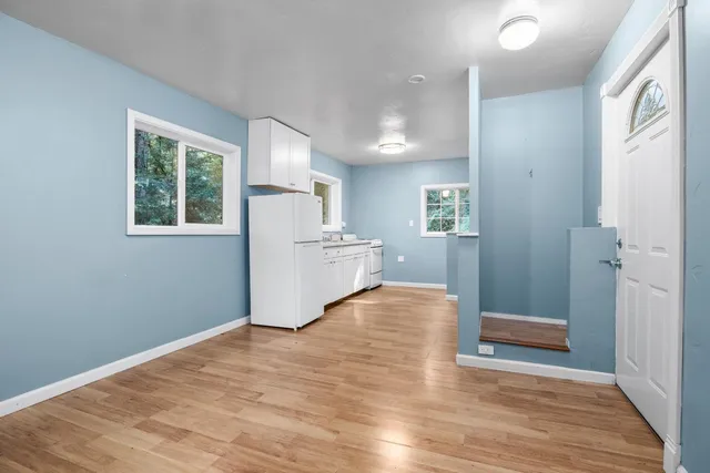 a view of livingroom with wooden floor