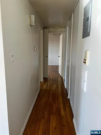 a view of a bathroom from the hallway