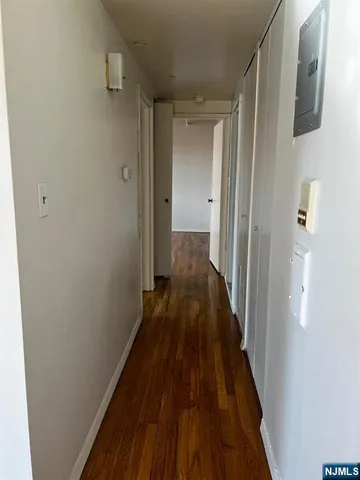 a view of a bathroom from the hallway