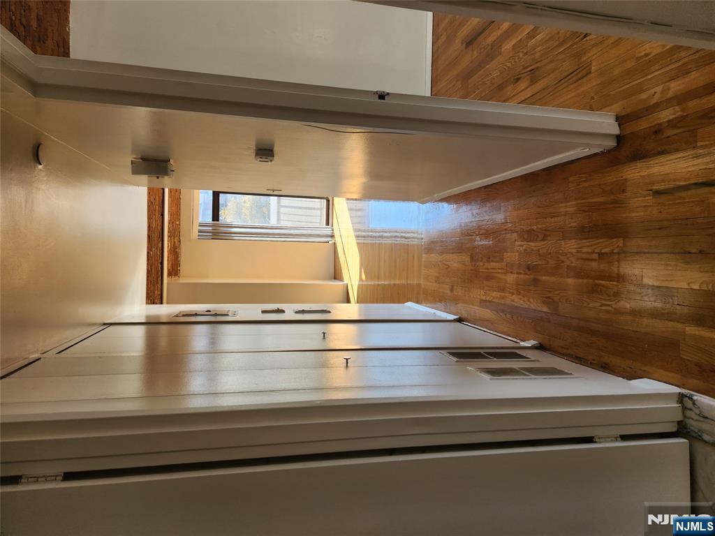 840 River Road, Unit 207 Edgewater, NJ 07020 - Photo 7 of 13 a view of gallery with wooden floor