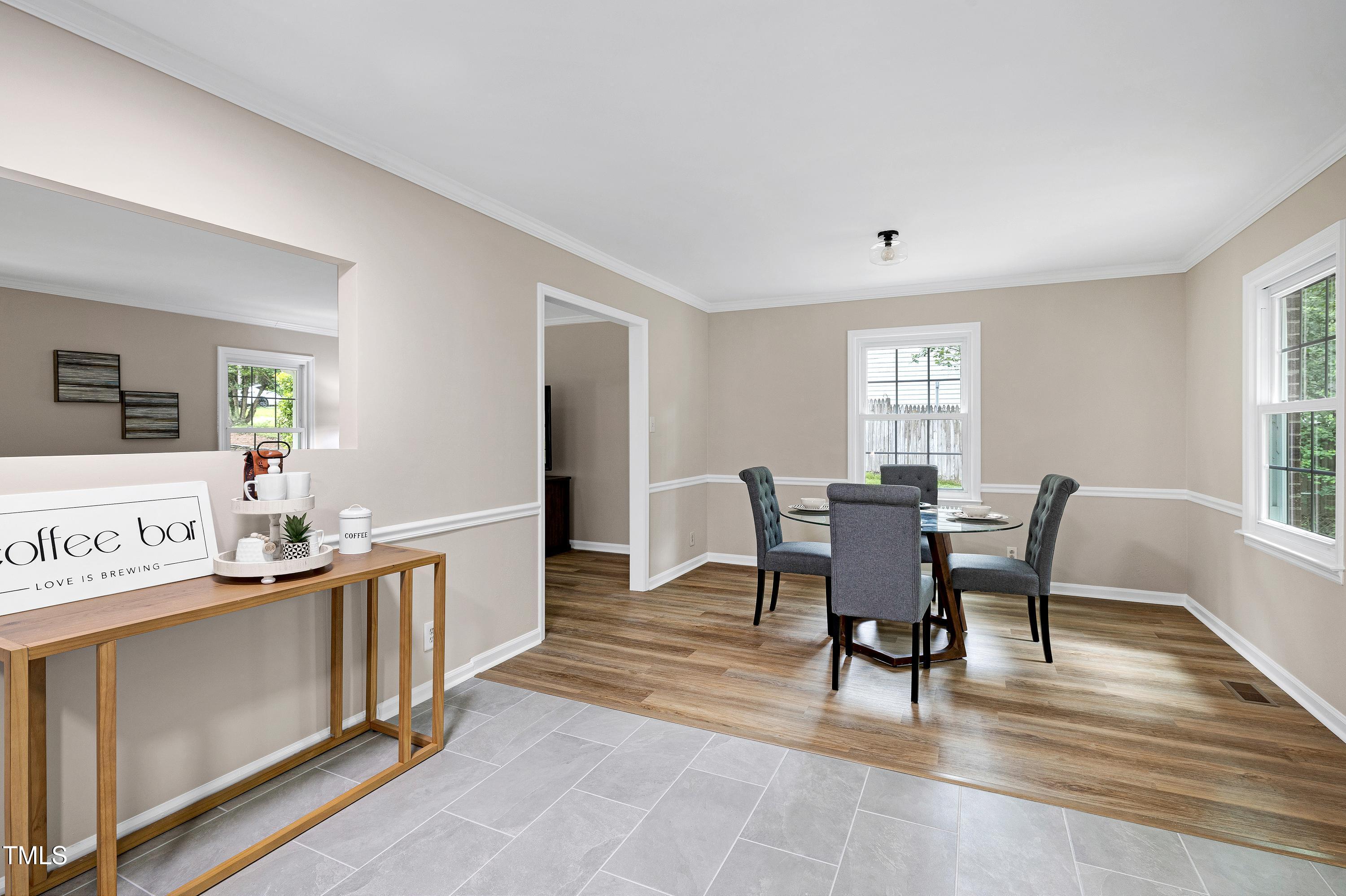 5121 Raintree Road Durham, NC 27712 - Photo 18 of 59 a view of a dining room with furniture and window