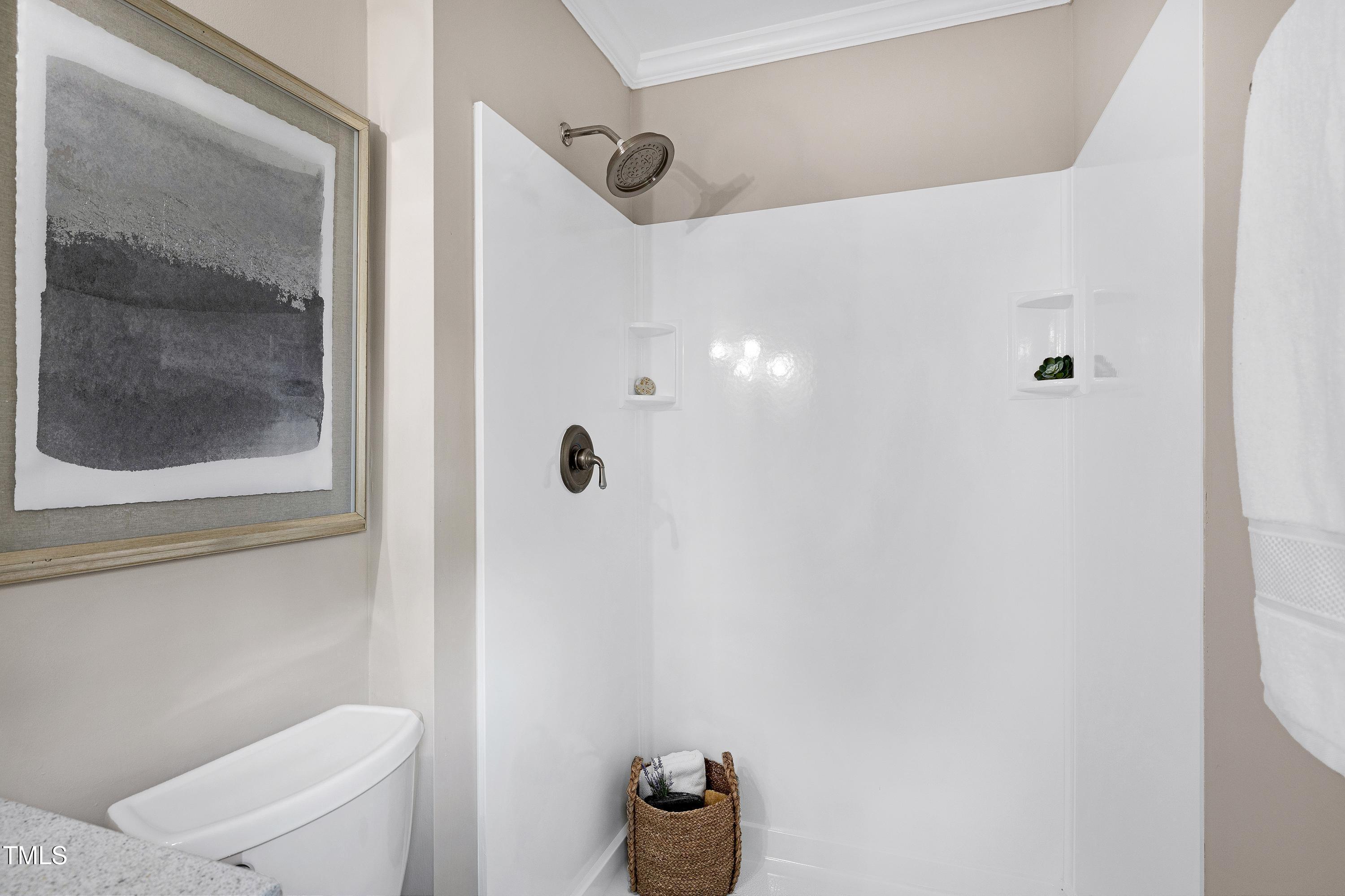 5121 Raintree Road Durham, NC 27712 - Photo 31 of 59 a bathroom with a toilet and a shower