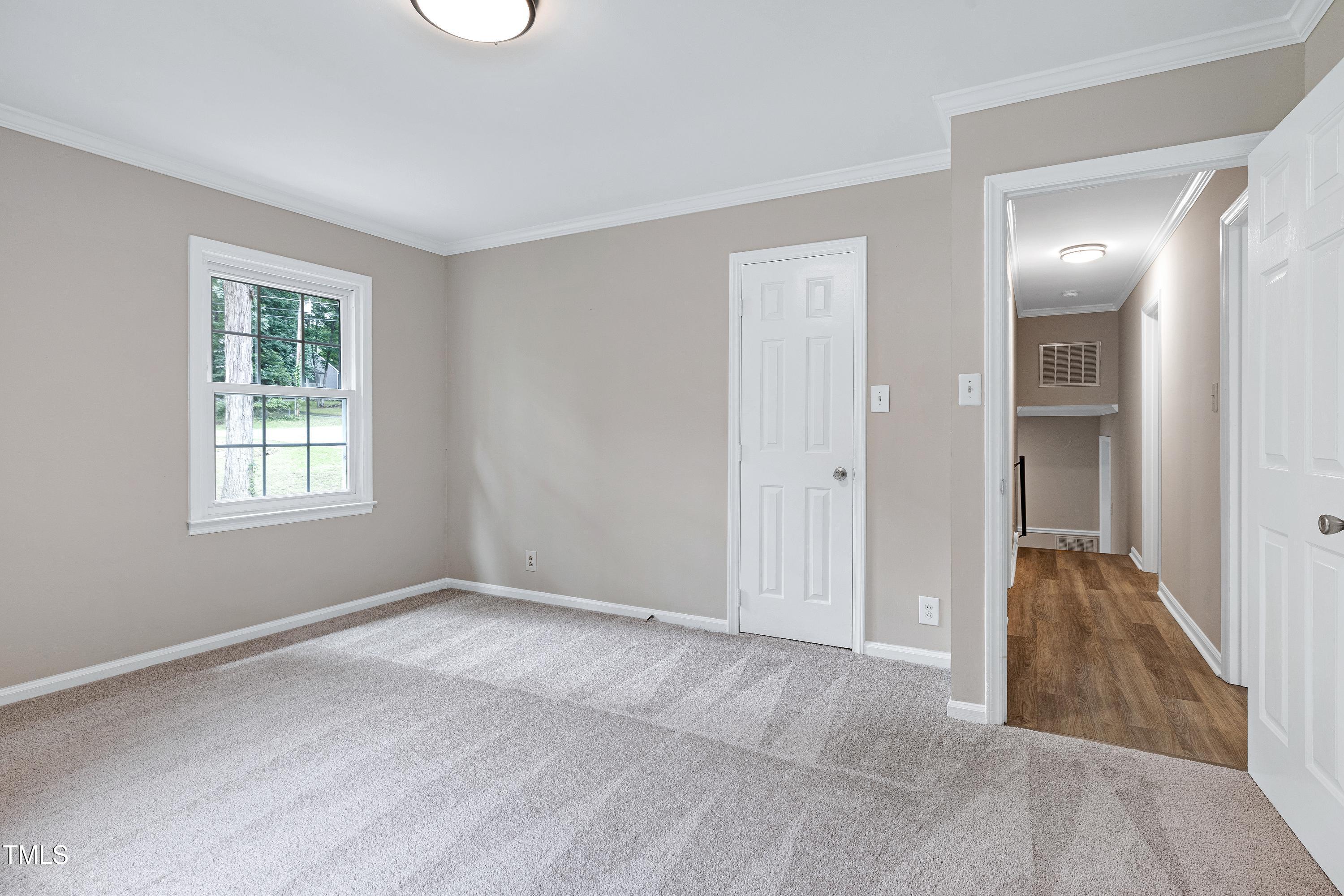 5121 Raintree Road Durham, NC 27712 - Photo 36 of 59 wooden floor in an empty room with a window